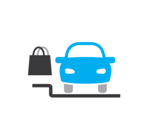 A front-end view of a car with a shopping back floating next to it